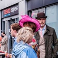 Man Wearing Bowler Hat and Woman with Pink Hat