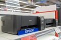 Epson printers on shelf at electronics store. Minsk, Belarus - may 03, 2024