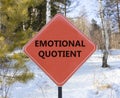 EQ emotional quotient symbol. Concept words EQ emotional quotient on beautiful red road sign. Beautiful forest snow blue sky Royalty Free Stock Photo