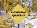 EQ emotional quotient symbol. Concept words EQ emotional quotient on beautiful yellow road sign. Beautiful forest snow sky Royalty Free Stock Photo