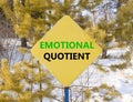 EQ emotional quotient symbol. Concept words EQ emotional quotient on beautiful yellow road sign. Beautiful forest snow sky
