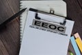 Equal Employment Opportunity Commission EEOC text on Document form isolated on office desk