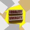 Equality diversity words written on wood blocks. ETolerance inclusion social and business concept