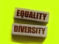 Equality diversity words written on wood blocks. Tolerance inclusion social and business concept