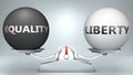 Equality and liberty in balance - pictured as a scale and words Equality, liberty - to symbolize desired harmony between Equality