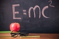 Equation E=mc2 handwritten on blackboard Royalty Free Stock Photo