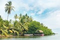 Equatorial forest and boats Royalty Free Stock Photo