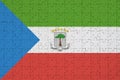 Equatorial Guinea flag is depicted on a folded puzzle Royalty Free Stock Photo
