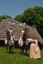 Equestrian Crusaders with folklore dancer