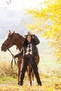 Equestrian with her horse Royalty Free Stock Photo