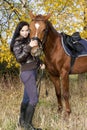 Equestrian with her horse Royalty Free Stock Photo
