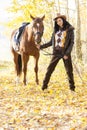 Equestrian with her horse Royalty Free Stock Photo