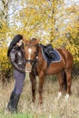 Equestrian with her horse Royalty Free Stock Photo