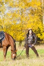 Equestrian with her horse Royalty Free Stock Photo