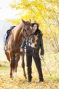 Equestrian with her horse Royalty Free Stock Photo