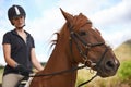 Equestrian, horse and woman riding in nature on adventure and journey in countryside. Ranch, animal and rider outdoor Royalty Free Stock Photo