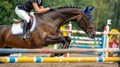 Equestrian rider showing precision and athleticism while jumping in a striking close up view.