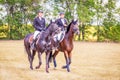 Equestrian sport dressage, walkthrough - two young girls in jockey clothes are sitting on a horse Royalty Free Stock Photo