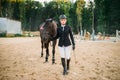 Equestrian sport, female jockey and horse