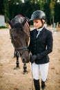Equestrian sport, female jockey and horse