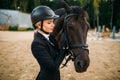 Equestrian sport, female jockey and horse face