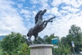 Equestrian statue of a bronze horse in the center of Merano, South Tyrol