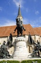 The equestrian statue of the King Matthias Corvinus in front of the Church of Saint Michael in Cluj Napoca. Royalty Free Stock Photo