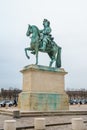 Equestrian statue of Louis XIV on Place d`Armes in front of Palace of Versailles. Palace Versailles was a royal chateau Royalty Free Stock Photo