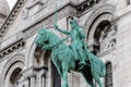 Equestrian statue of of Saint Joan of Arc at the Basilica of the Sacred Heart of Paris, at the summit of the butte Montmartre, the Royalty Free Stock Photo