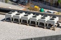 Equipment of air conditioner units on a roof of an industrial building