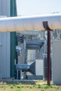 Equipment, cables and piping as found inside of industrial power plant