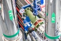 Equipment, cables and piping as found inside of a industrial workshop