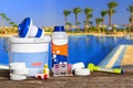 Equipment with chemical cleaning products and tools for the maintenance of the swimming pool.