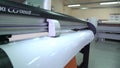 The rolled cutting plotter. Polygraphy. Close up. Industrial use