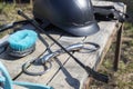 Equipment for horse care and riding: brushes, bridle, whip, helmet, bandages, bit