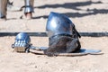 Equipment knight - the participant in the knight festival - shield, sword, helmet and glove lie on the ground near the lists Royalty Free Stock Photo