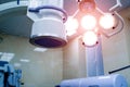 Equipment and medical devices in modern operating room. Operating theatre. Selective focus. Lightning in clinic. Closeup Royalty Free Stock Photo