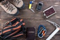 Equipment for mountaineering and hiking on wooden background. Royalty Free Stock Photo