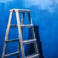 Equipment, after painting the walls of a room. Blue wall. Work at home. Detail of a staircase, in the room. Blue shades