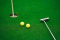 Equipment for playing golf. golf ball on lip of cup Royalty Free Stock Photo