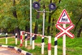 Equipment for rail crossing. Special signs, trafficlight, barrier at rail crossing Royalty Free Stock Photo