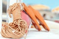 The equipment of the rescue station on the beach - a rope against the background of buoys and a lifebuoy Royalty Free Stock Photo