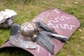 Equipment of a Roman legionnaire on the ground, Shield, helmet, sword and chain mail