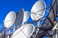 Equipment to connect satellite and cable services on the background of blue sky . Royalty Free Stock Photo