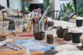 Equipments and handcraft tools on working table ready to make ceramic work, art hobby