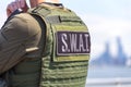 Equipped swat soldier standing on a peir Royalty Free Stock Photo