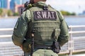 Equipped swat soldier standing on a peir Royalty Free Stock Photo