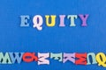 EQUITY word on blue background composed from colorful abc alphabet block wooden letters, copy space for ad text. Learning english Royalty Free Stock Photo