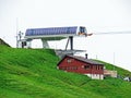 4er Sesselbahn Sternen zum Klein Sternen or 4-seater Chairlift Hoch-Ybrig - Seebli Kl. Sternen on the slopes of the Schwyz Alps Royalty Free Stock Photo