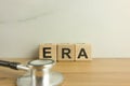 ERA estrogen receptor assay acronym from wooden blocks with stethoscope